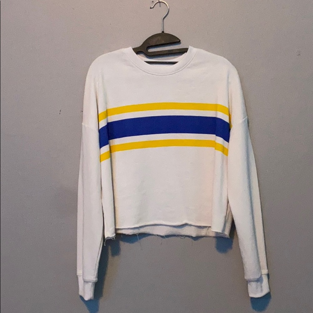 White, yellow, and blue, crewneck sweatshirt.